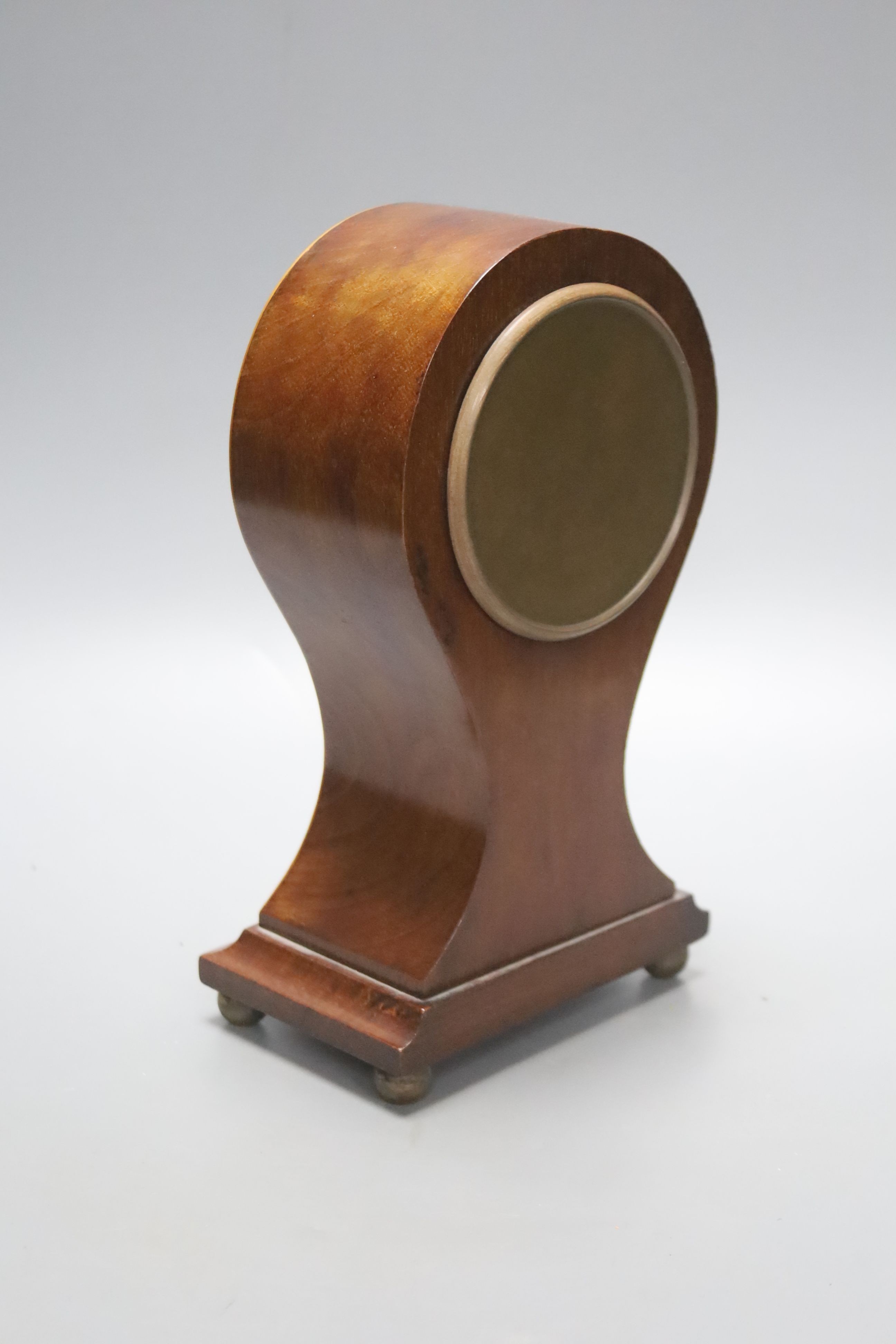 An Edwardian inlaid mahogany balloon cased timepiece, height 24cm